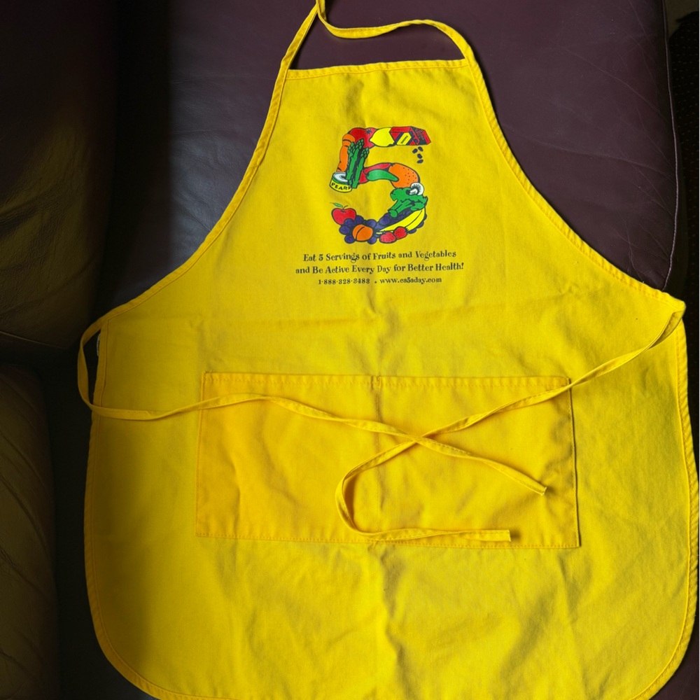 Vibrant Yellow Apron with Colorful Design.make offer.